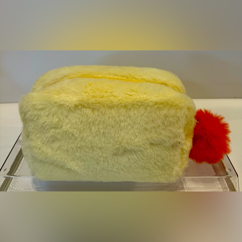 Fluffy Yellow Pouch